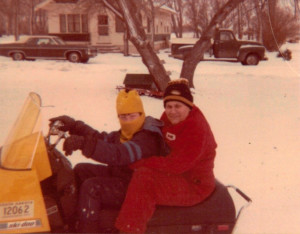 Elva Snowmobiling With Grandson in Columbia